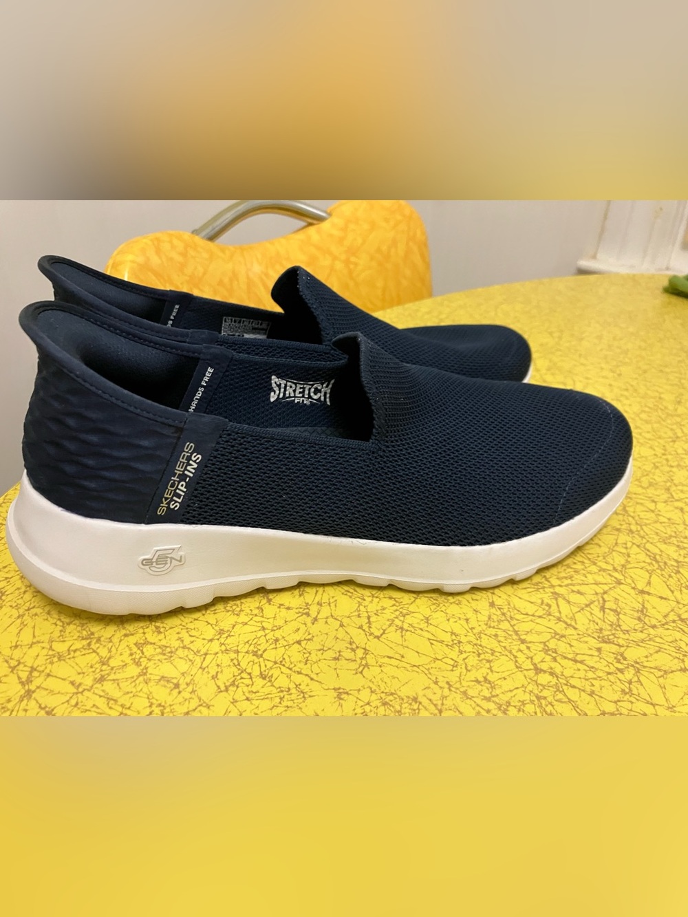 Women’s Skechers Navy Knit Slip-ins size 10